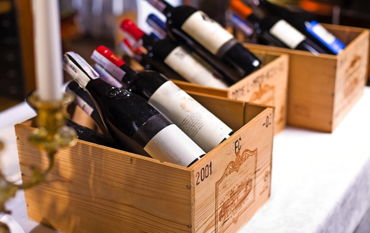 Wine bottles in wooden boxes.