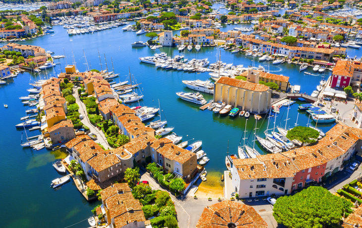 View Of Colorful Houses And Boats In Port Grimaud During Summer Day-Port Grimaud, France