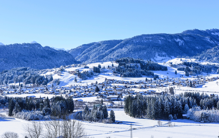 verschneites Fischen im Allgäu